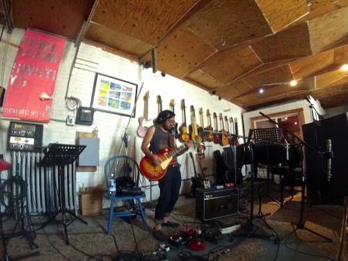 Guitarist Oscar Rodriguez lays down a track for the YouTube Audio Library